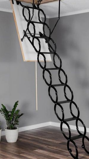 A black concertina loft ladder.